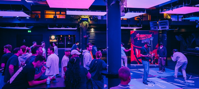 Guests immersed in the Synthesis VR stations at A'DAM VR Game & Race Park, located in A'DAM Tower, Amsterdam, experiencing cutting-edge virtual reality adventures in a dynamic and interactive environment.